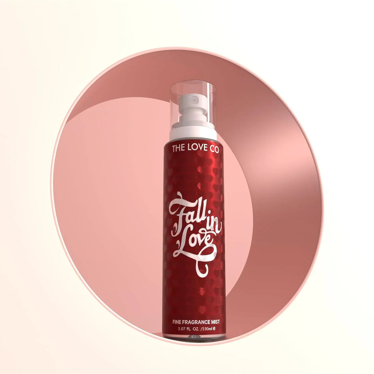 The Love Co Fall in Love fine fragrance mist red spray bottle on pink background