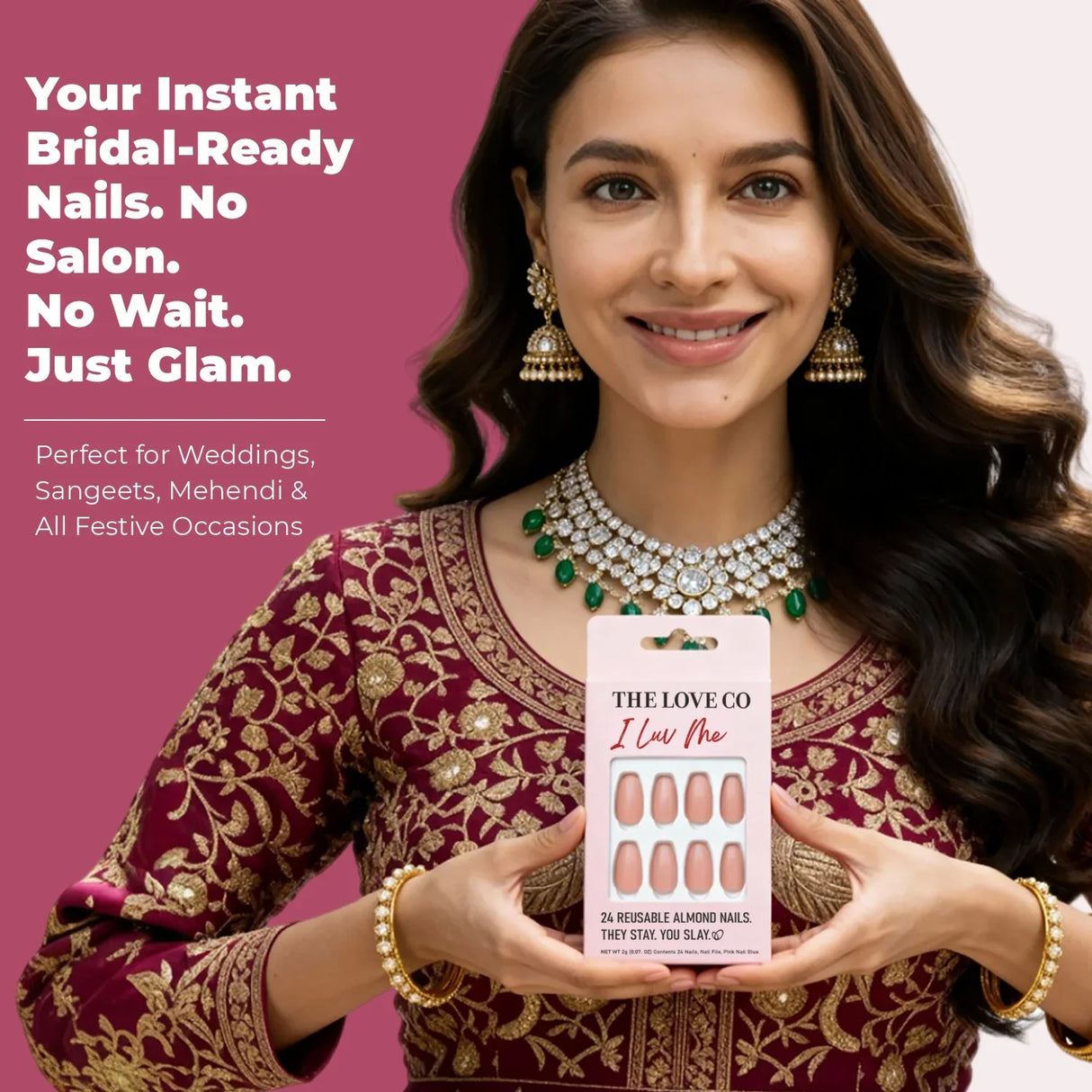 Woman in bridal attire holding The Love Co almond press-on nails, festive jewelry, pink background