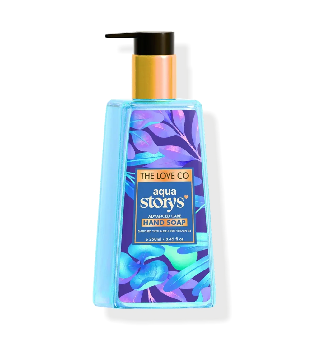 The Love Co Aqua Storys hand soap bottle with blue floral design and gold pump