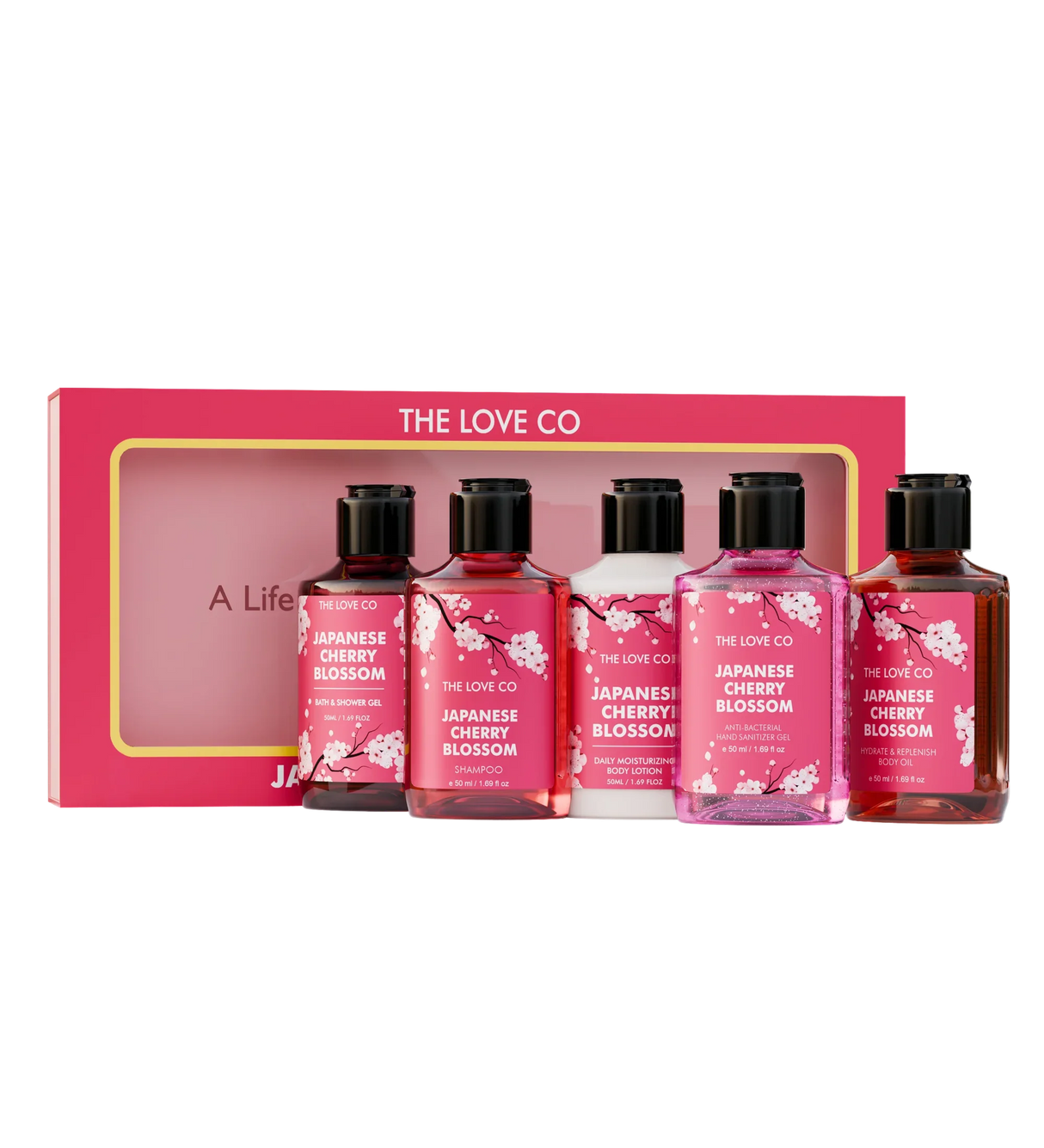 A gift set containing four mini travel-sized personal care products with Japanese Cherry Blossom branding, including body wash, body lotion, shampoo, and hand sanitizer, presented in a pink box.