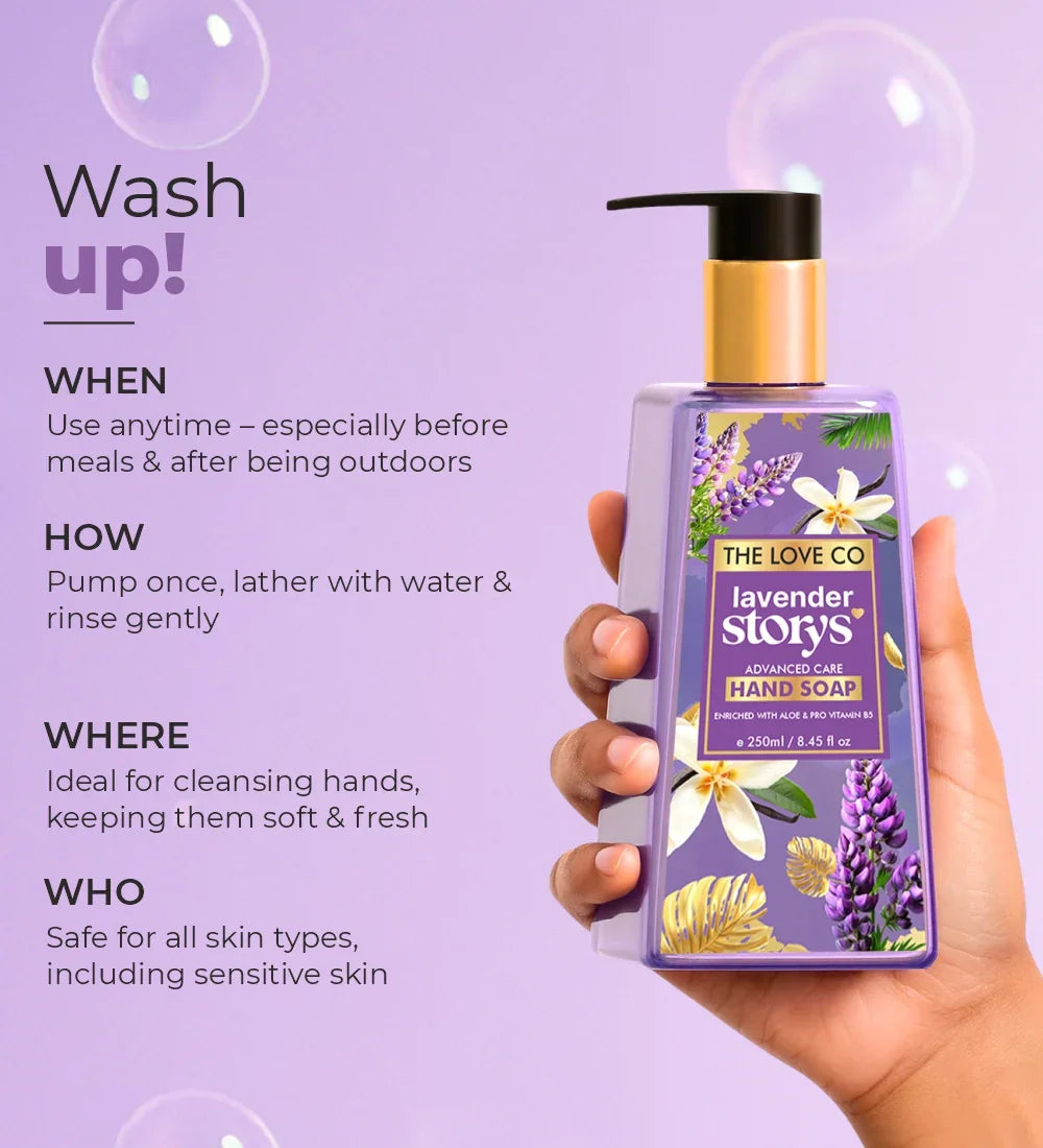Hand holding The Love Co Lavender Story hand soap bottle with flowers, purple background, bubbles