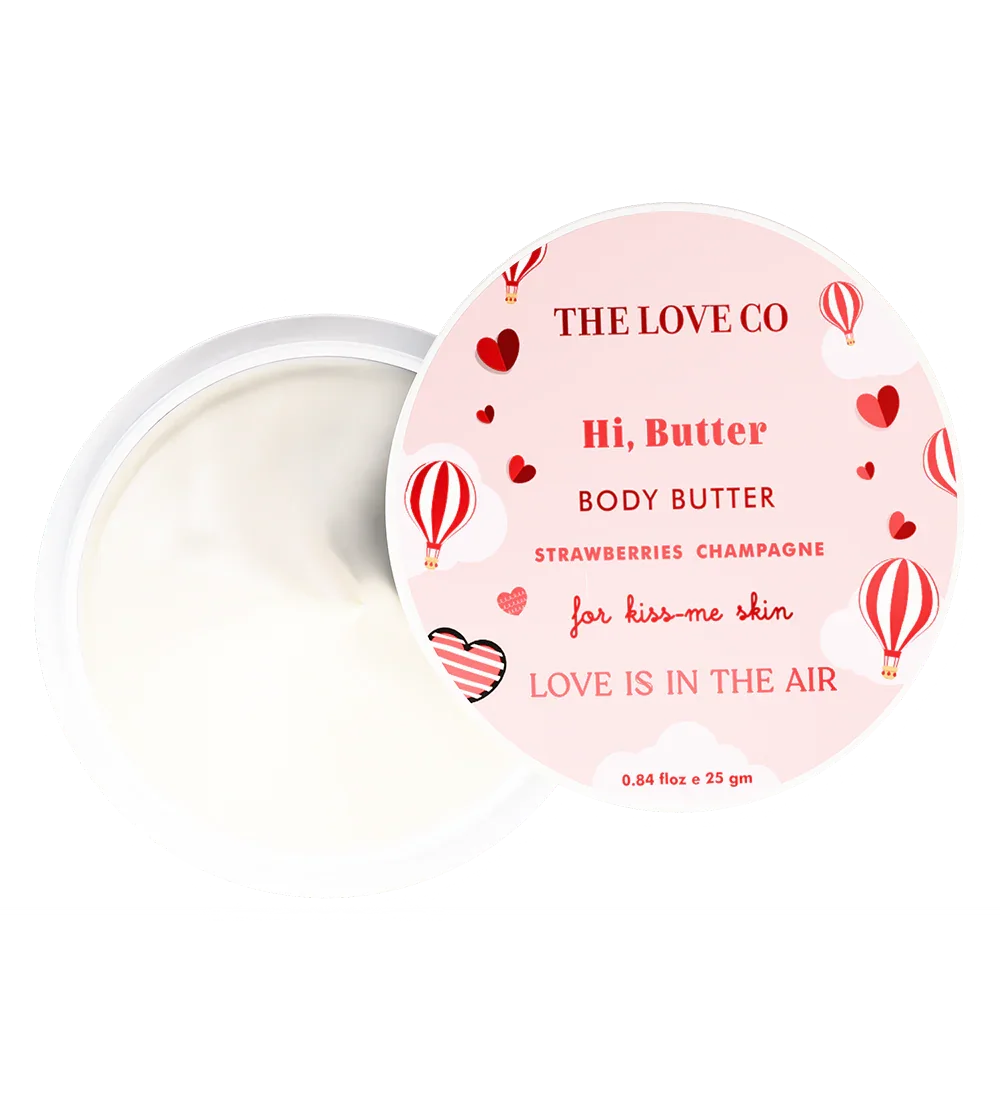 The Love Co Hi Butter body butter jar with strawberries champagne label, hot air balloons, and hearts.