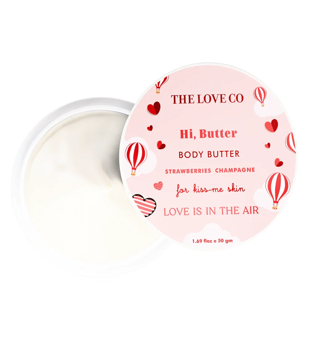 The Love Co Hi Butter Body Butter open jar with pink lid, strawberries champagne scent, red hot air balloons and hearts design.
