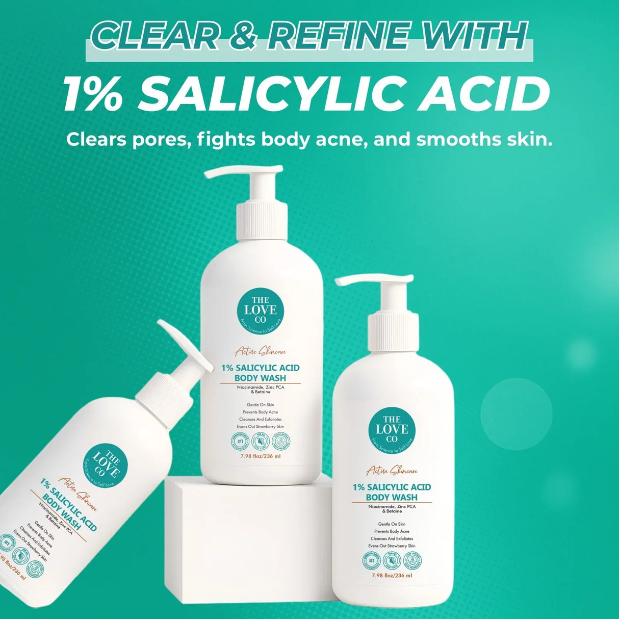 Three The Love Co. 1% Salicylic Acid Body Wash bottles for body acne on a teal background.