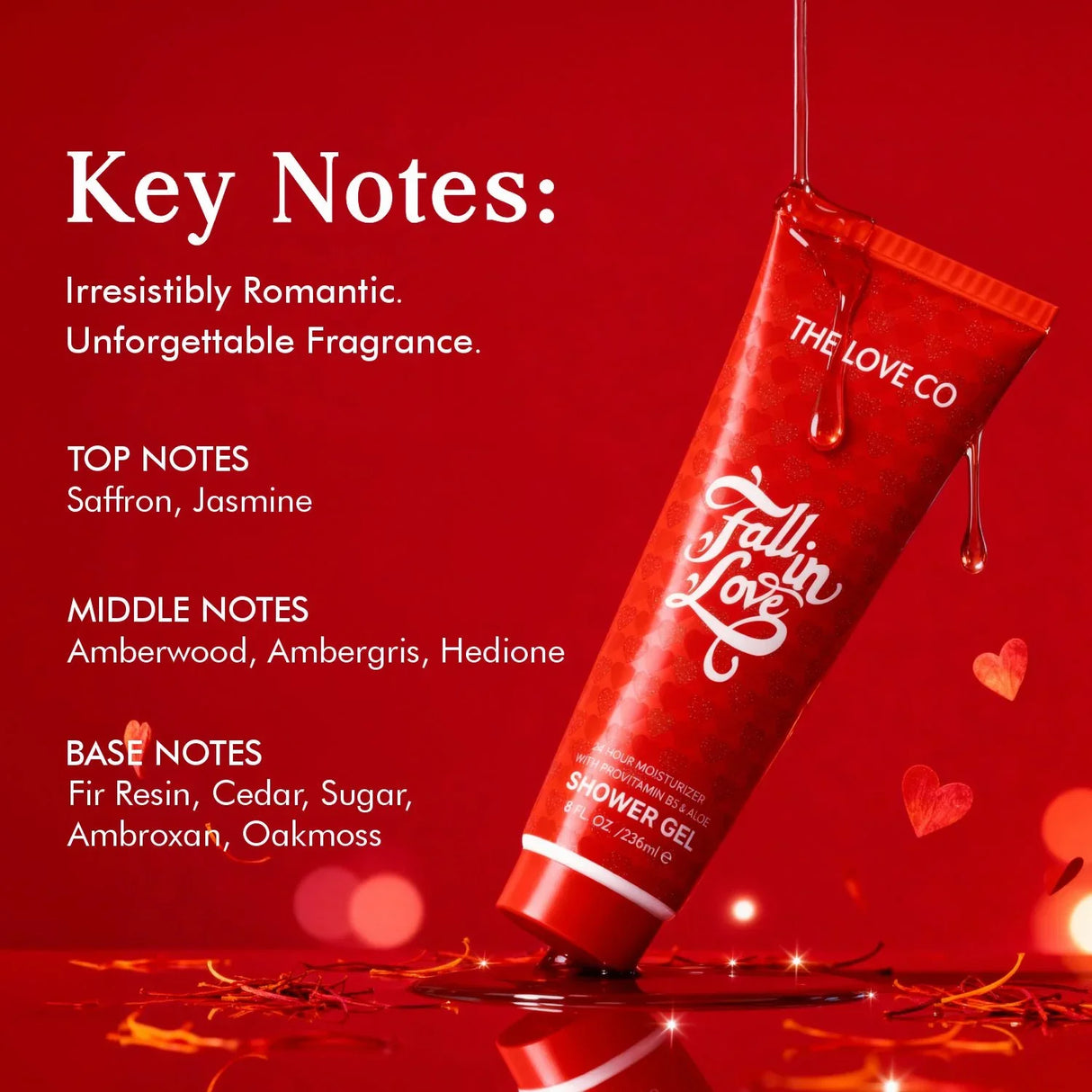 Fall in Love shower gel by The Love Co in a red tube with fragrance notes, saffron, hearts, and golden liquid on a red background.
