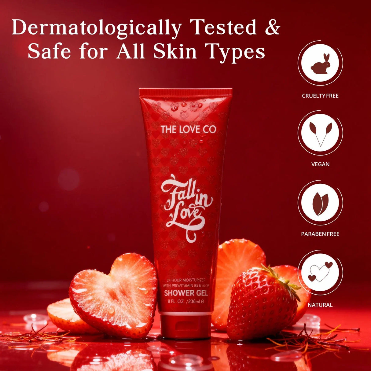 Fall In Love Shower Gel by The Love Co, surrounded by strawberries, cruelty free, vegan