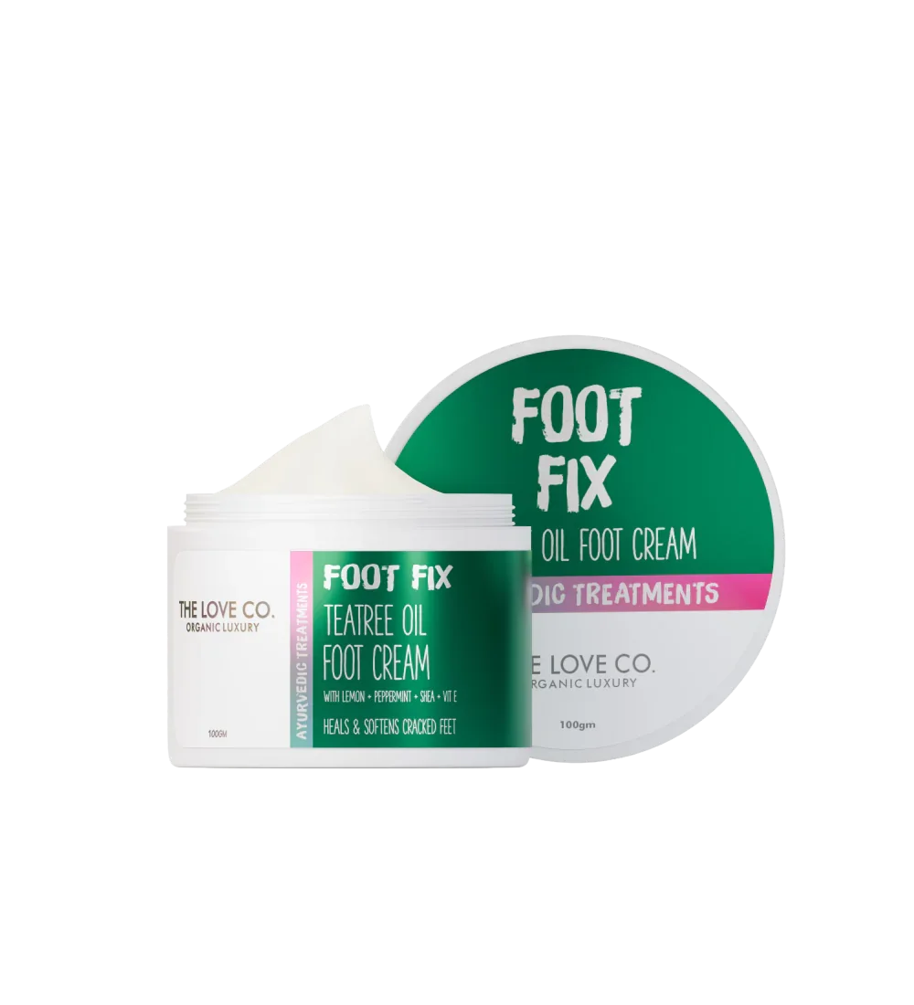 Foot Fix Tea Tree Oil Foot Cream by The Love Co., open jar with green and white label