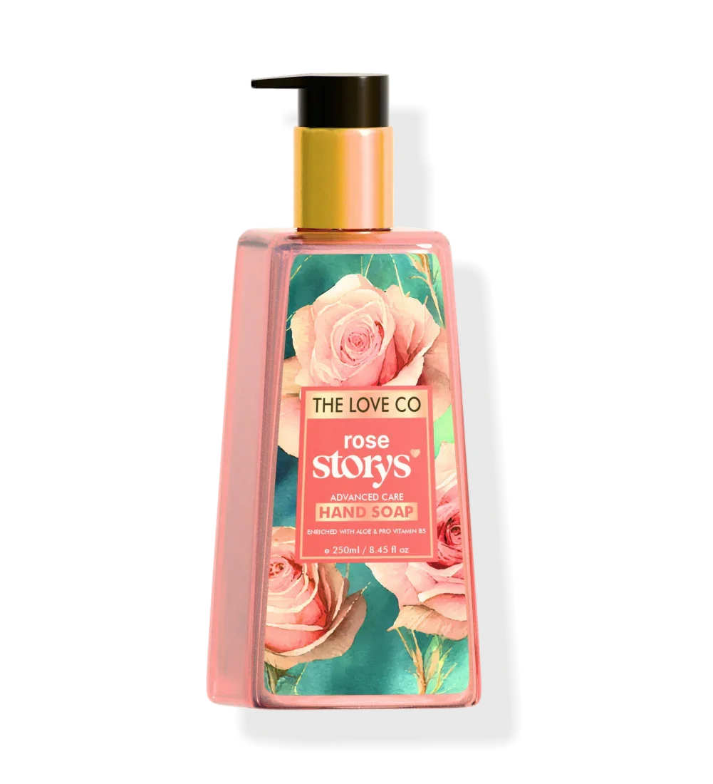 The Love Co Rose Story hand soap bottle with floral label and gold pump dispenser.