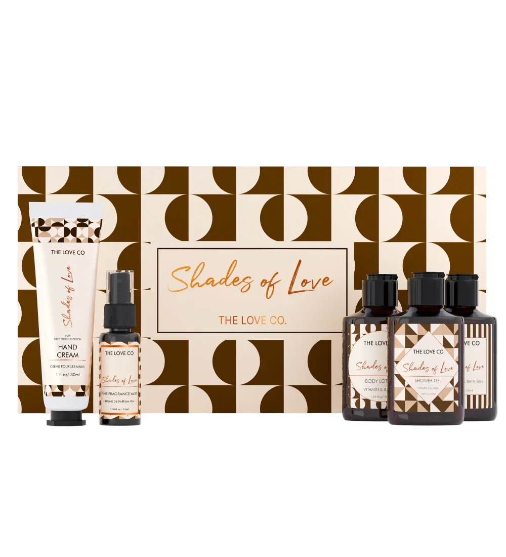 A collection of cosmetic products from Shades of Love, including a body wash, body lotion, bath salt, hand cream, and body mist, presented with a decorative background.