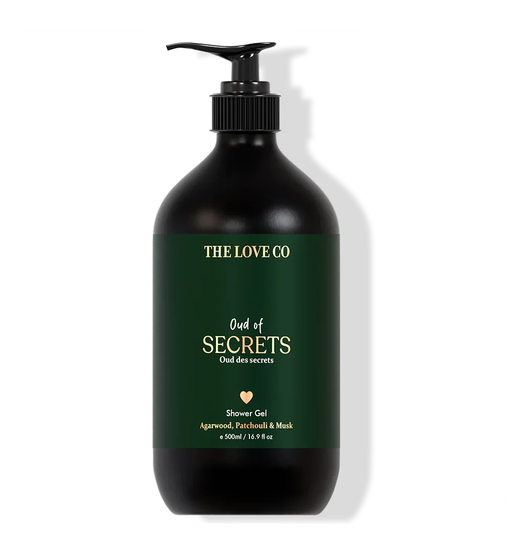 Black shower gel bottle with green label on a white background
