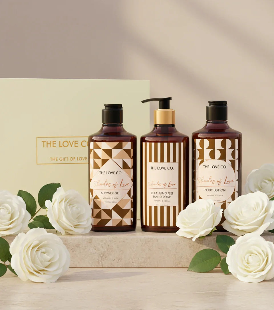 The Love Co. Shades of Love gift box with shower gel, hand soap, body lotion, and white roses.