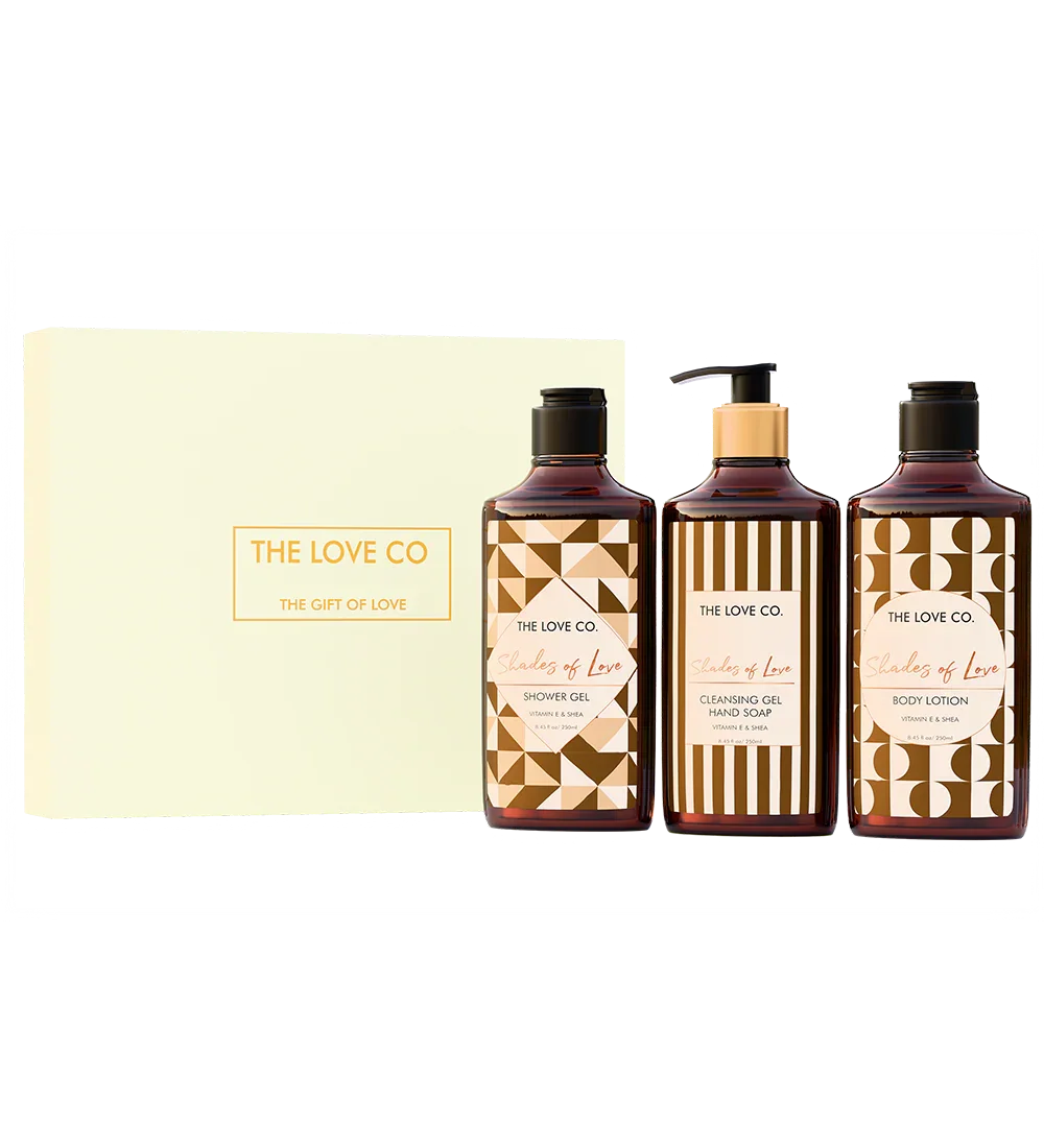 The Love Co white gift box with three Shades of Love soap, lotion, and gel bottles
