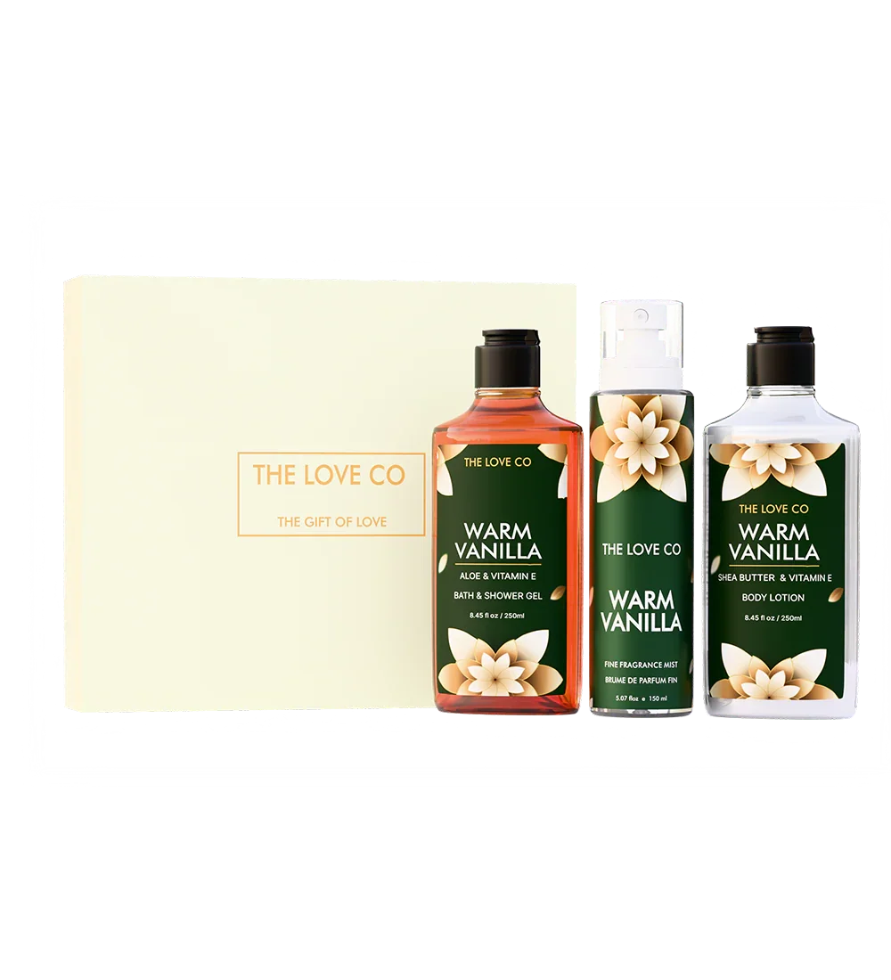 The Love Co white gift box with Warm Vanilla bath and body set, featuring shower gel, mist, and lotion.