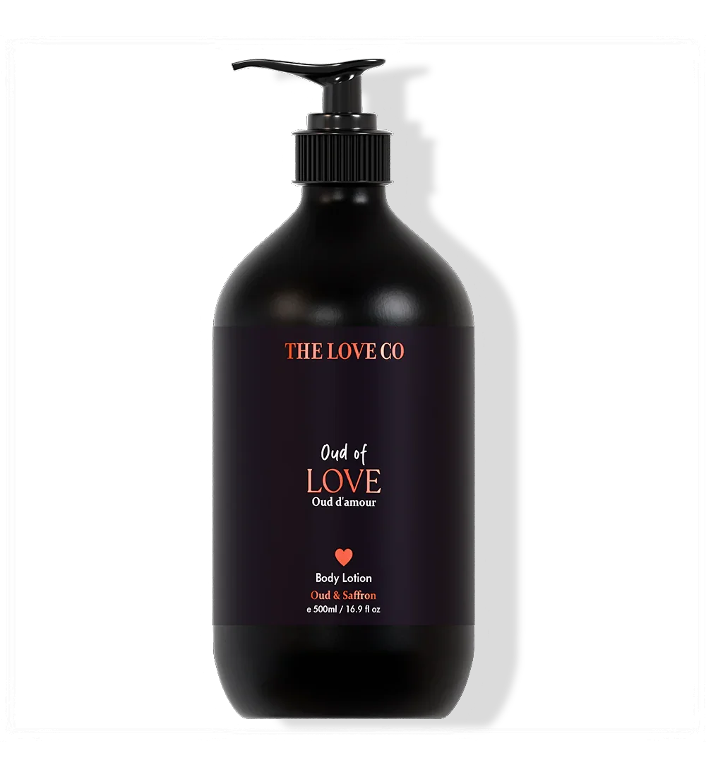 The Love Co Oud of Love body lotion bottle, 500ml, with black pump and saffron oud label