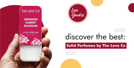 Hand holding The Love Co Japanese Cherry Blossom solid perfume tin with floral design