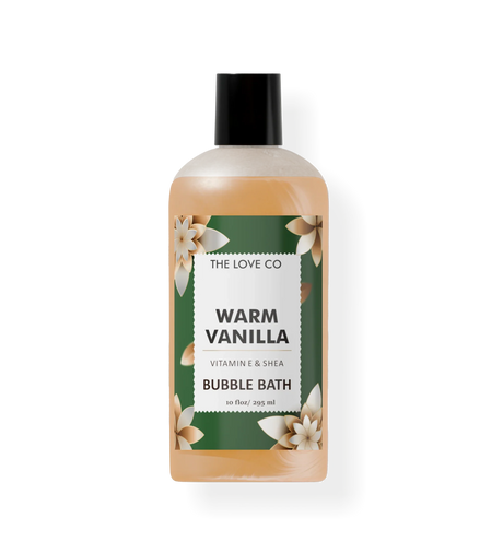 Warm vanilla bubble bath bottle by The Love Co with floral label and green accents