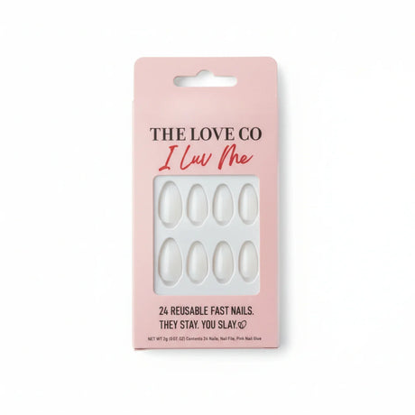 The Love Co I Luv Me pink packaging with white reusable press on nails