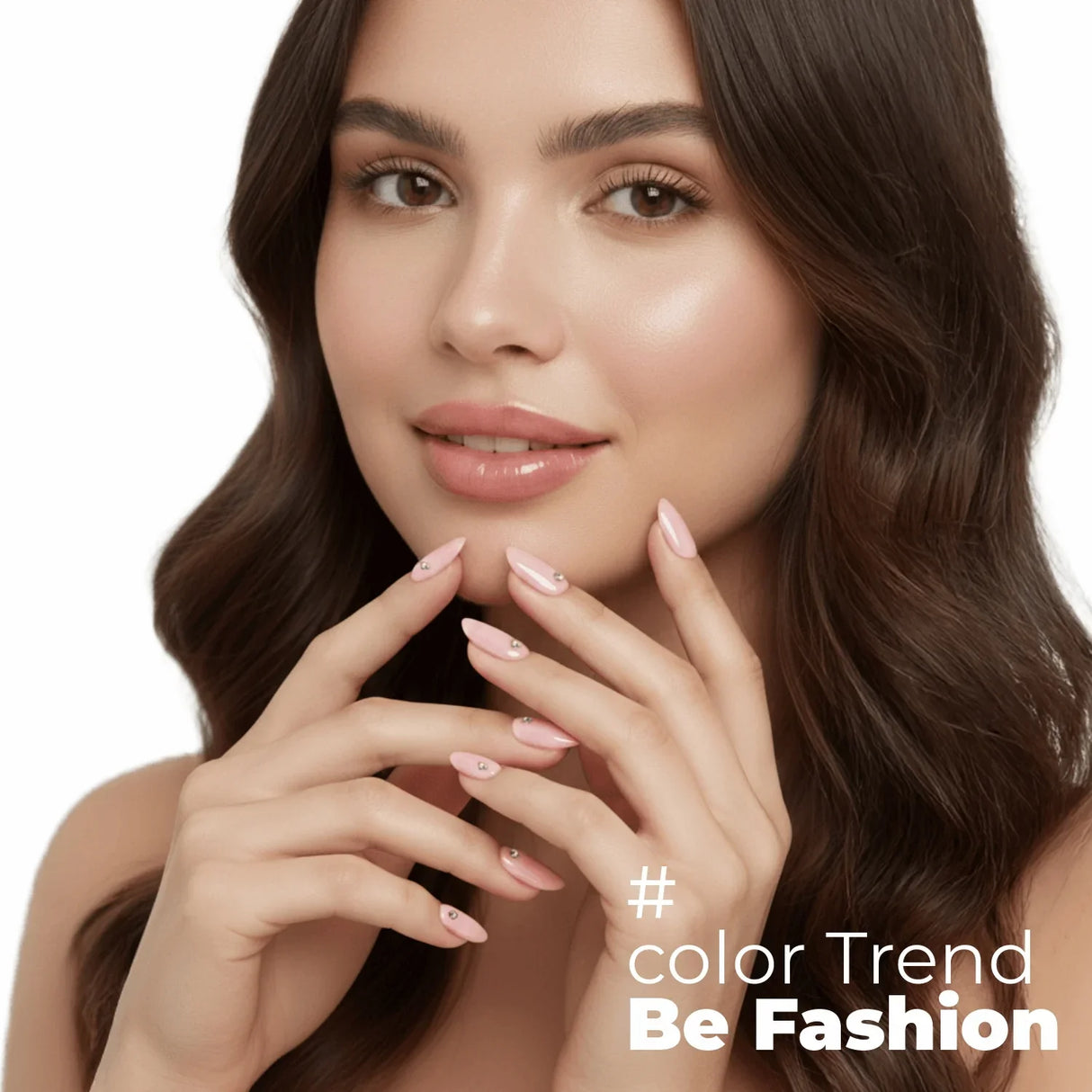 Woman with long oval pink rhinestone nails, glossy makeup, and brown wavy hair, nail art trend