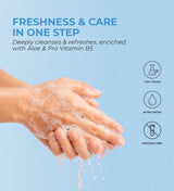Hands washing with foaming aqua hand wash, vegan, pH balanced, paraben free, blue background