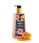 Honey Story's hand soap bottle with pump, honeycomb, and fig design on label