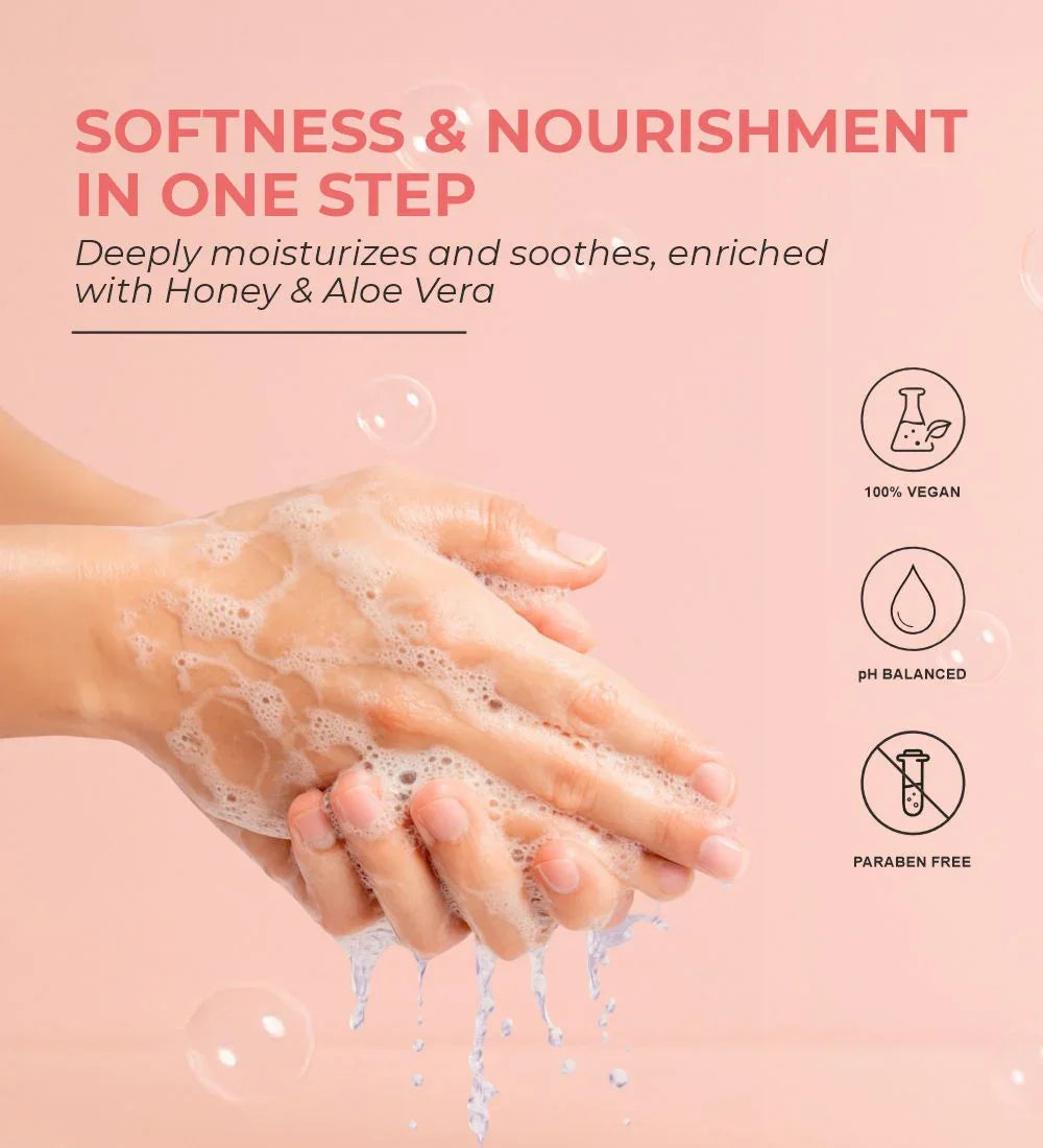 Hands washing with foamy honey hand wash, pink background, vegan, paraben free, pH balanced