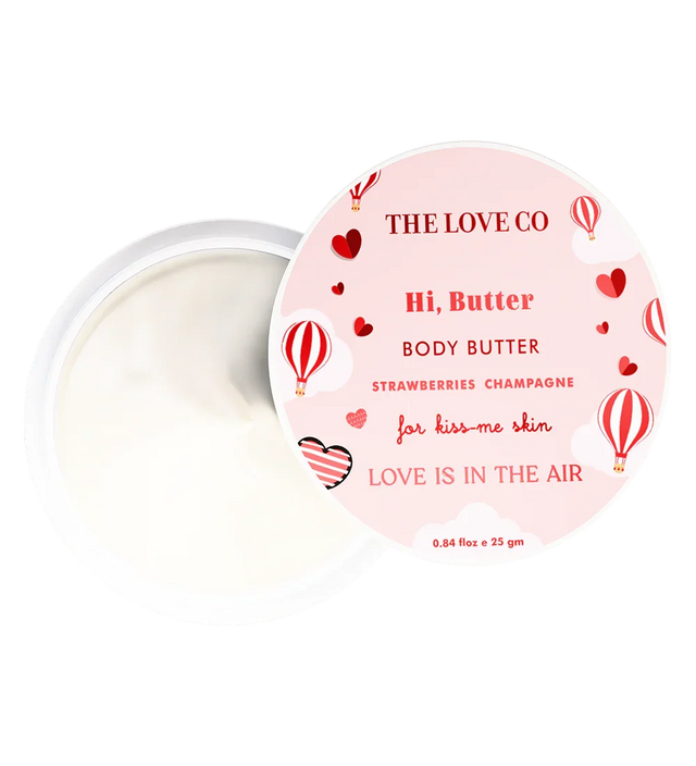 The Love Co Hi Butter body butter jar with strawberries champagne label, hot air balloons, and hearts.