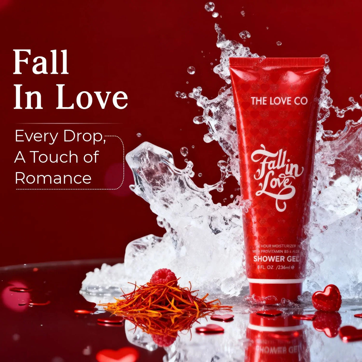 Fall In Love shower gel by The Love Co in red tube with splash, saffron, and raspberry on red background