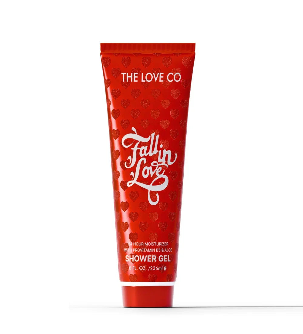 Red shower gel tube with 'The Love Co' branding on a white background