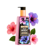 Floral hand wash bottle with hibiscus flowers and leaves, labeled 'The Love Co Floral Storys'.
