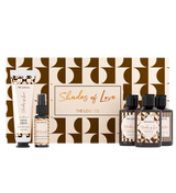 A collection of cosmetic products from Shades of Love, including a body wash, body lotion, bath salt, hand cream, and body mist, presented with a decorative background.