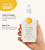 Hand holding The Love Co SPF 50 sunscreen body lotion 325ml with usage instructions