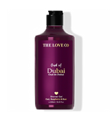 Purple bottle of 'Oud of Dubai' shower gel by The Love Co on a white background