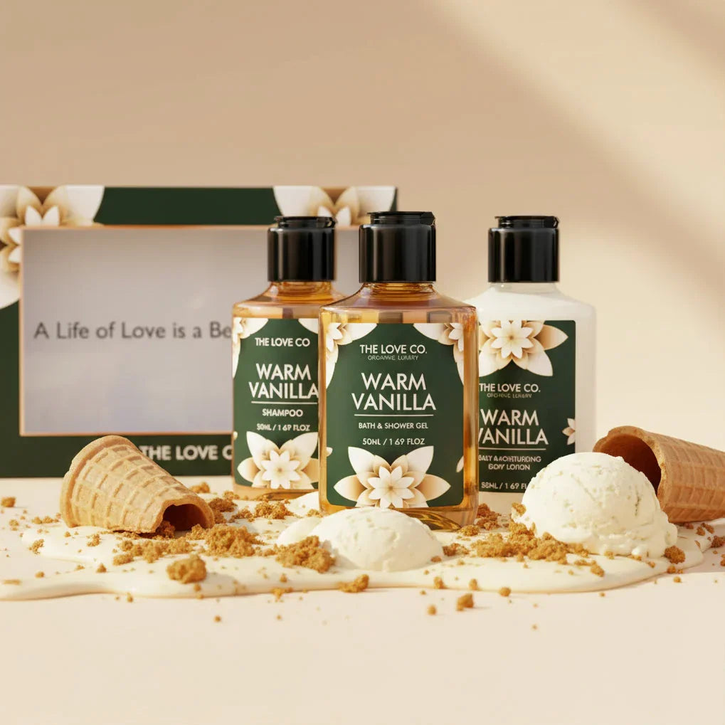 Three bottles of 'Warm Vanilla' products from 'The Love Co.' on a decorative background with vanilla-themed elements.