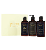 The Love Co Oud Accord gift box with bath and shower gel, hand wash, and body lotion bottles