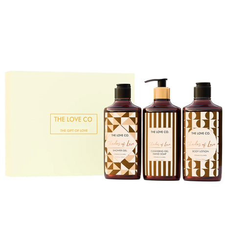 The Love Co white gift box with three Shades of Love soap, lotion, and gel bottles