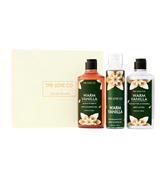 The Love Co white gift box with Warm Vanilla bath and body set, featuring shower gel, mist, and lotion.