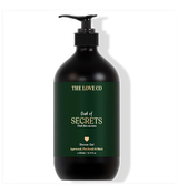 Black bottle of 'Oud of Secrets' shower gel from The Love Co on a white background
