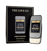 Zeenat Al-Oud Solid perfume by The Love Co with packaging on a white background